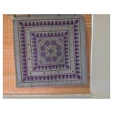 Handcrafted Textile With Purple Geometric Patterns