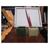 Green and Yellow Ceramic Holders With Incense