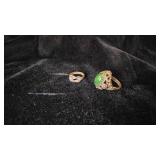 Two Rings with Green Stone and Knot Design