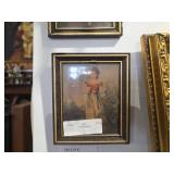 Girl holding cat signed Jane Freeman