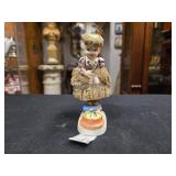 Figurine of Girl w/ Bonnet & Flared Skirt