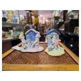 Porcelain Figurines - Pair w/ House Motif