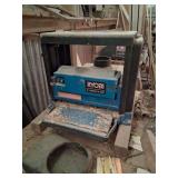 RYOBI 10 INCH SURFACE PLANER.