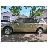 2005 KIA SEDONA. INCLUDES JAZZY RIDE ABOUT AND CRANE IN BACK OF VAN TO LIFT IN AND OUT. WILL NEED TOWED - NEEDS GAS AND BATTERY