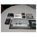Misc Music Bundle. Behringer TD-3 and octave pedal. Stereo amplifier. Microphone preamp. Guitar to midi converter. Headphone amplifier. DAC converter. Direct Box. All in Good Condition.