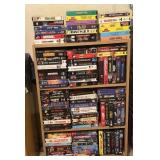 BOOKCASE AND VHS MOVIES