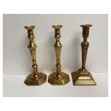 Pair Of Solid Brass Candlesticks Plus One