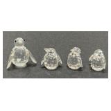 Four Swarovski Miniature Penguins