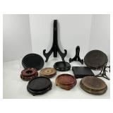 Eleven Wooden Stands and Brass Stand