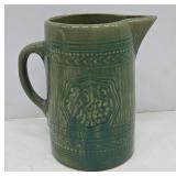 Green Ceramic Pitcher with Embossed Design
