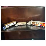 TWO DORITOS AND PEPSI TOY TRUCKS