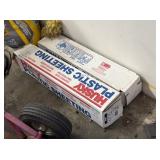TWO ROLLS OF PLASTIC SHEETING