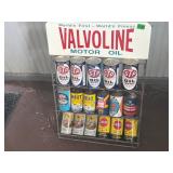 VINTAGE OIL CANS ON STAND