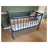 ANTIQUE CRIB WITH DOLL