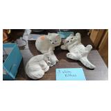 THREE WHITE KITTEN FIGURES