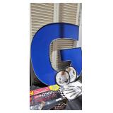 BLUE LETTER G SIGN