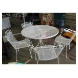 WROUGHT IRON PATIO TABLE AND FOUR CHAIRS
