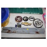 VEHICLE EMBLEMS AND LAWNMOWER BLADES