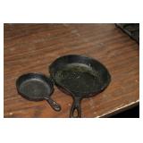 2 SMALL CAST IRON SKILLETS, 1 IS LODGE