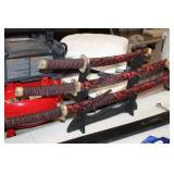 3 SWORDS ON STAND