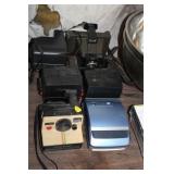 6 POLAROID CAMERAS
