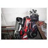 SET OF GOLF CLUBS AND 2 GOLF BAGS