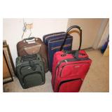 4 SUITCASES