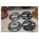 4 FORD WHEEL ORNAMENTS