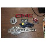 LOT OF VEHICLE EMBLEMS
