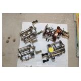 4 BAIT CASTER REELS