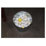 BUCKET OF GOLF BALLS