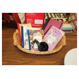 BASKET OF  COOKBOOKS & MEASURING CUPS