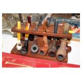 LOT OF VINTAGE PIPES ON STAND