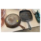 TWO CAST IRON SKILLETS