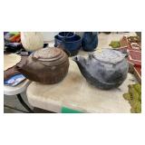 TWO CAST IRON KETTLES