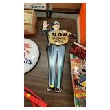 Slow metal sign