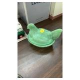 Jadeite hen in nest