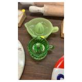 2 Green glass juicers