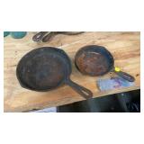TWO SMALL CAST IRON SKILLETS
