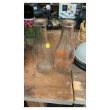 2 Milk bottles, one is Shelbyville