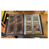 SMALL BINDER OF YU-GI-OH CARDS