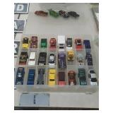 Over 25 Hotwheel and Matchbox Cars with Case