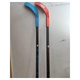 Two Nerf Hockey Sticks