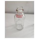 Two Glass Milk Bottles