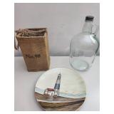 Decorative Plate, Glass Jug, and Burlap Bag