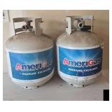 Two 20lb Propane bottles.