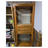 Lighted display case with glass shelves