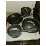 Six piece Calphalon with 4 lids