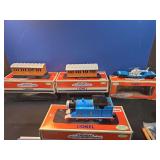 Four Lionel Thomas the Tank Engine and Friends Train Cars.