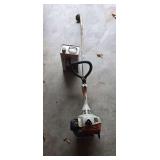 Stihl FS38 weed eater and (2)partial cans of MotoMix